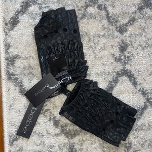 **RESERVED TILL 12/3** Bebe genuine leather leopard print fingerless gloves BNWT